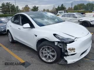 2023 Tesla Model Y Long Range with VIN 7SAYGAEE2PF763662, listed as a IAAI auction lot 43412618 with 43,857 mi miles and . Bid and sale history available at DreamBid. Image 1.