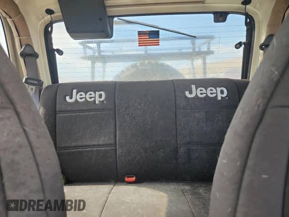 1999 Jeep Wrangler Sahara с VIN 1J4FY49S4XP411704, выставлен на аукционе Copart как лот 71826235 с пробегом Не указан миль и Списание • Salvage title. История ставок и продаж доступна на DreamBid. Изображение 10.