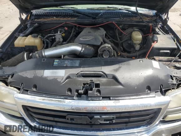 2005 GMC Sierra 1500 SLE z VIN 2GTEK13T751200347, wystawiony jako Copart lot #60863495 z przebiegiem 272 891 mil mil oraz Czysty tytuł • Clean title. Historia ofert i sprzedaży dostępna na DreamBid. Obrazek 11.