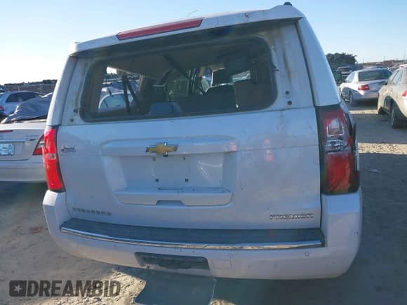 2019 Chevrolet Suburban Premier with VIN 1GNSCJKC0KR293658, listed as a IAAI auction lot 40563834 with 153,619 mi miles and . Bid and sale history available at DreamBid. Image 16.