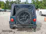 1999 Jeep Wrangler Sport with VIN 1J4FY19S7XP435204, listed as a Copart auction lot 83820835 with 263,738 mi miles and Clean title. Bid and sale history available at DreamBid. Image 6.