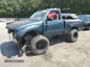 1998 Toyota Tacoma z VIN 4TAPM62N3WZ098830, wystawiony jako Copart lot #64984913 z przebiegiem 236 102 mil mil oraz Szkoda całkowita • Salvage title. Historia ofert i sprzedaży dostępna na DreamBid. Obrazek 1.