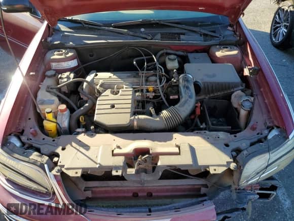 2004 Chevrolet Malibu Classic with VIN 1G1ND52F84M692489, listed as a Copart auction lot 40058164 with 67,717 mi miles and Salvage title. Bid and sale history available at DreamBid. Image 11.