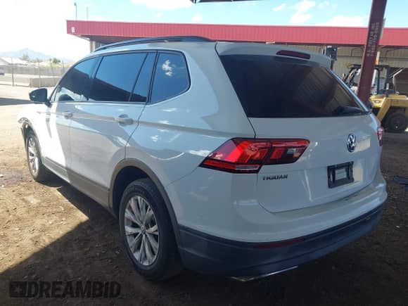 2018 Volkswagen Tiguan S с VIN 3VV1B7AX3JM067887, выставлен на аукционе IAAI как лот 43216100 с пробегом 124 903 миль миль и . История ставок и продаж доступна на DreamBid. Изображение 3.