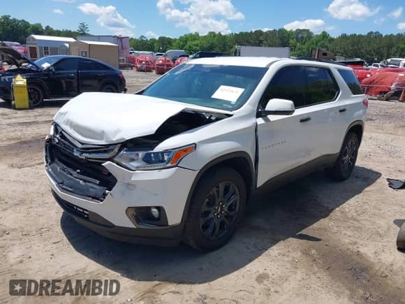 2020 Chevrolet Traverse RS z VIN 1GNERJKW9LJ298430, wystawiony jako IAAI lot #42335631 z przebiegiem 129 241 mil mil oraz . Historia ofert i sprzedaży dostępna na DreamBid. Obrazek 2.