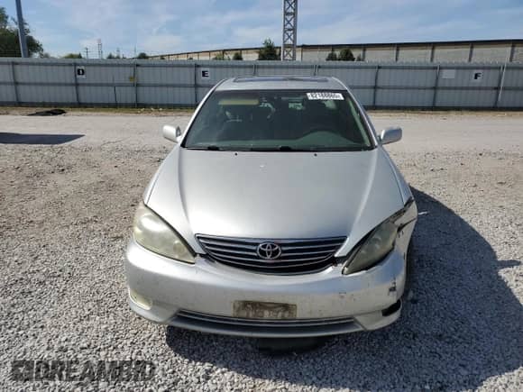 2005 Toyota Camry XLE с VIN 4T1BF30K35U614921, выставлен на аукционе Copart как лот 82188865 с пробегом 180 619 миль миль и Списание • Salvage title. История ставок и продаж доступна на DreamBid. Изображение 5.