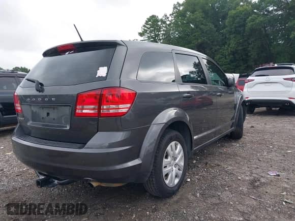 2014 Dodge Journey American Value with VIN 3C4PDCAB4ET182655, listed as a IAAI auction lot 42921924 with 177,090 mi miles and . Bid and sale history available at DreamBid. Image 4.