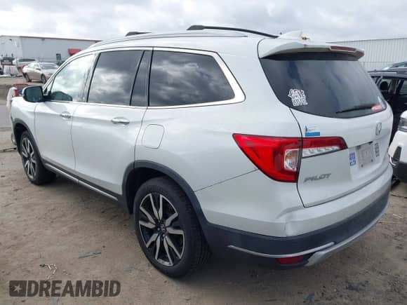 2021 Honda Pilot Elite with VIN 5FNYF6H04MB079091, listed as a IAAI auction lot 42739979 with 62,723 mi miles and . Bid and sale history available at DreamBid. Image 3.