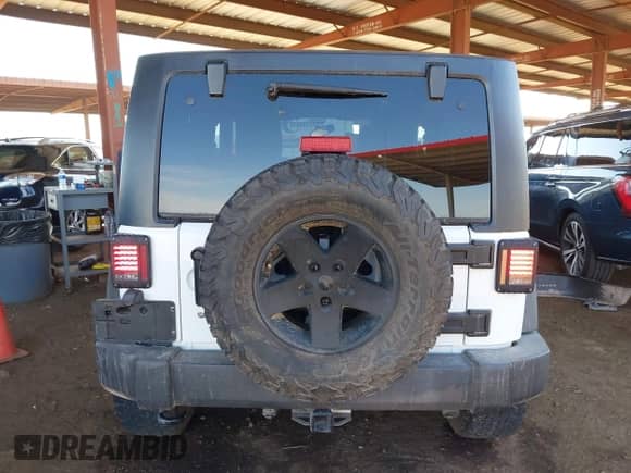 2012 Jeep Wrangler Sport с VIN 1C4AJWAG1CL175909, выставлен на аукционе IAAI как лот 41906220 с пробегом 80 450 миль миль и . История ставок и продаж доступна на DreamBid. Изображение 16.