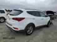 2017 Hyundai Santa Fe 2.4L z VIN 5NMZU3LB7HH050822, wystawiony jako Copart lot #81871005 z przebiegiem 101 559 mil mil oraz Szkoda całkowita • Salvage title. Historia ofert i sprzedaży dostępna na DreamBid. Obrazek 3.