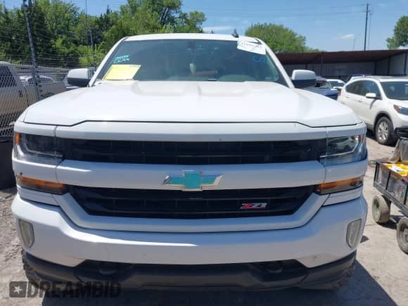 2018 Chevrolet Silverado 1500 LT with VIN 3GCUKRECXJG129377, listed as a IAAI auction lot 42856782 with 177,359 mi miles and . Bid and sale history available at DreamBid. Image 12.