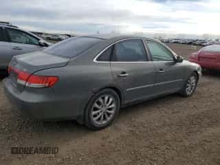 2006 Hyundai Azera SE с VIN KMHFC46FX6A050648, выставлен на аукционе Copart как лот 77229354 с пробегом 315 616 миль миль и Списание • Salvage title. История ставок и продаж доступна на DreamBid. Изображение 3.
