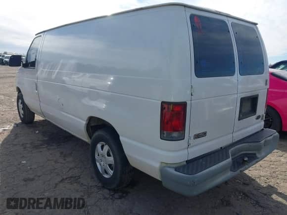 2002 Ford Econoline Cargo with VIN 1FTRE14252HB67887, listed as a IAAI auction lot 41180872 with 274,561 mi miles and . Bid and sale history available at DreamBid. Image 3.