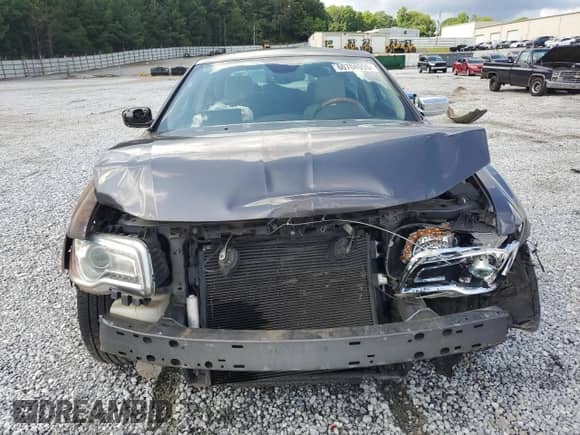 2014 Chrysler 300 C z VIN 2C3CCAKT6EH164443, wystawiony jako Copart lot #60704055 z przebiegiem 156 099 mil mil oraz Szkoda całkowita • Salvage title. Historia ofert i sprzedaży dostępna na DreamBid. Obrazek 5.