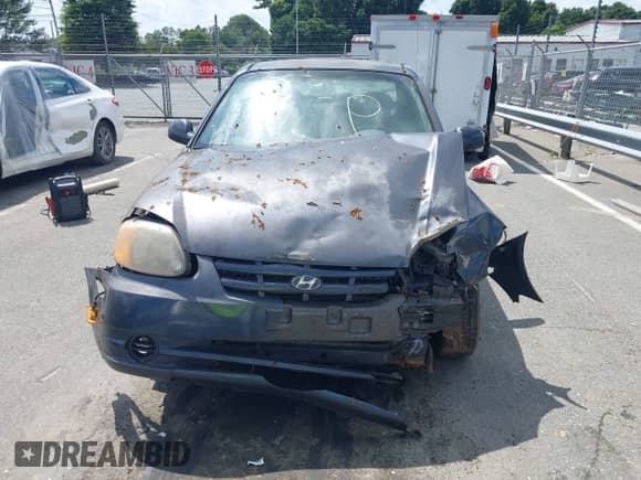 2005 Hyundai Accent GLS z VIN KMHCG35C35U366124, wystawiony jako IAAI lot #42552097 z przebiegiem 205 776 mil mil oraz . Historia ofert i sprzedaży dostępna na DreamBid. Obrazek 11.