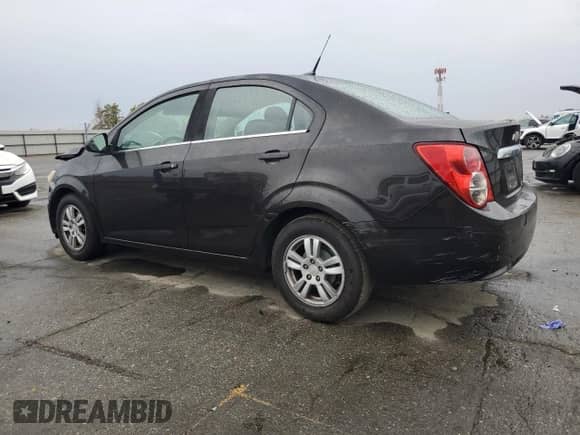 2014 Chevrolet Sonic LT z VIN 1G1JC5SG7E4106134, wystawiony jako Copart lot #80910575 z przebiegiem 149 644 mil mil oraz Szkoda całkowita • Salvage title. Historia ofert i sprzedaży dostępna na DreamBid. Obrazek 2.