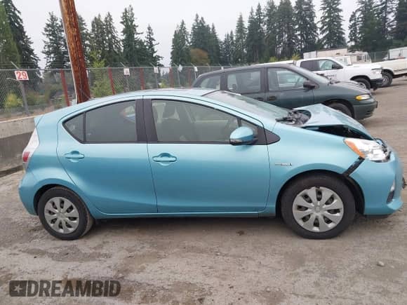 2014 Toyota Prius One with VIN JTDKDTB34E1076814, listed as a IAAI auction lot 43111499 with 142,988 mi miles and . Bid and sale history available at DreamBid. Image 13.
