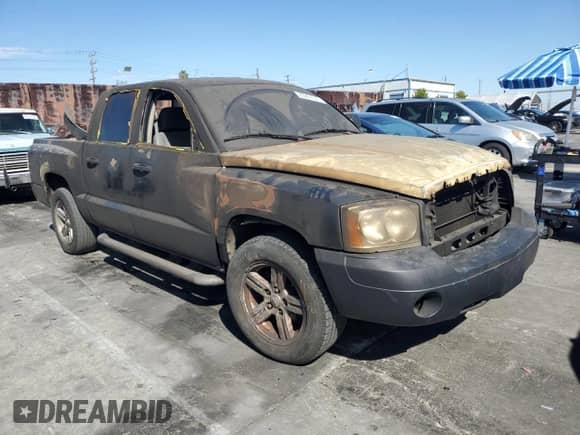 2007 Dodge Dakota SLT с VIN 1D7HE48N27S215105, выставлен на аукционе Copart как лот 85901675 с пробегом 190 259 миль миль и Списание • Salvage title. История ставок и продаж доступна на DreamBid. Изображение 4.