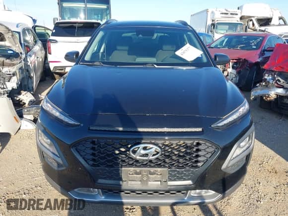 2020 Hyundai Kona SEL Plus z VIN KM8K62AA6LU518181, wystawiony jako IAAI lot #43075377 z przebiegiem 43 681 mil mil oraz . Historia ofert i sprzedaży dostępna na DreamBid. Obrazek 12.