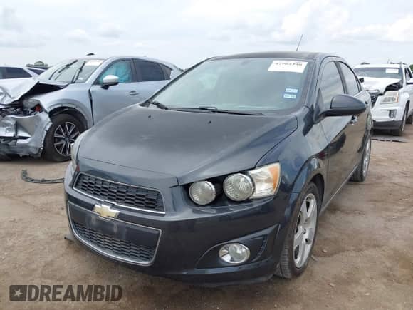 2015 Chevrolet Sonic LTZ with VIN 1G1JE5SB3F4101447, listed as a IAAI auction lot 42964440 with 148,815 mi miles and . Bid and sale history available at DreamBid. Image 2.