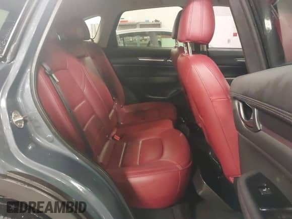 2022 Mazda CX-5 S Carbon Edition z VIN JM3KFBCM3N0527885, wystawiony jako IAAI lot #41226356 z przebiegiem 25 691 mil mil oraz . Historia ofert i sprzedaży dostępna na DreamBid. Obrazek 8.