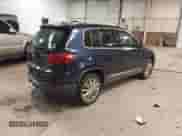 2014 Volkswagen Tiguan SEL with VIN WVGAV3AX8EW563008, listed as a IAAI auction lot 41356523 with 138,211 mi miles and . Bid and sale history available at DreamBid. Image 4.