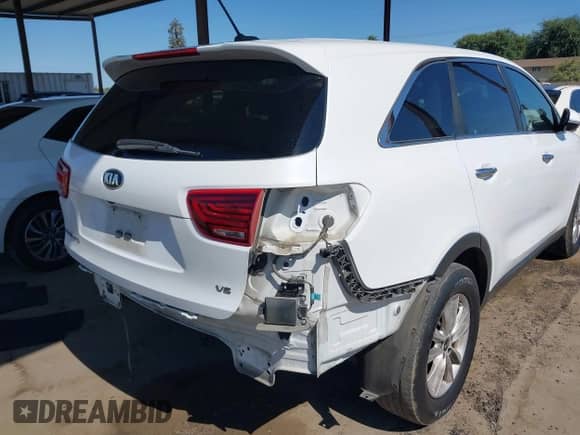 2019 Kia Sorento LX with VIN 5XYPG4A56KG470350, listed as a IAAI auction lot 42814201 with 142,132 mi miles and . Bid and sale history available at DreamBid. Image 6.