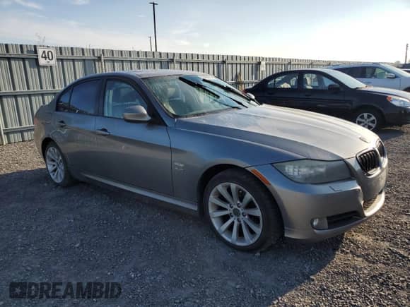 2011 BMW 3 Series 328i xDrive with VIN WBAPK7C50BA974967, listed as a Copart auction lot 71474715 with 240,609 mi miles and Clean title. Bid and sale history available at DreamBid. Image 4.