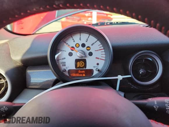 2012 MINI Hardtop S with VIN WMWSV3C56CTY25916, listed as a Copart auction lot 80962285 with 118,668 mi miles and Salvage title. Bid and sale history available at DreamBid. Image 9.