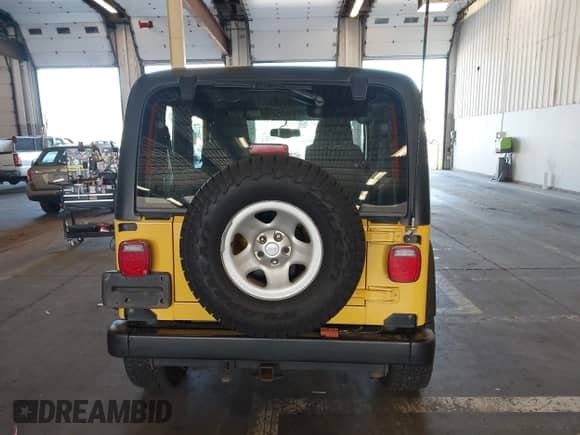 2003 Jeep Wrangler Sport with VIN 1J4FA49S23P374277, listed as a IAAI auction lot 43034946 with 141,376 mi miles and . Bid and sale history available at DreamBid. Image 16.