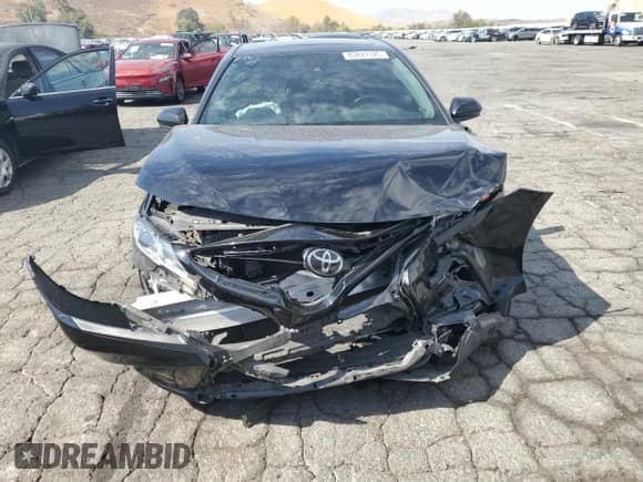 2019 Toyota Camry SE z VIN 4T1B11HK3KU166036, wystawiony jako Copart lot #83827125 z przebiegiem 131 811 mil mil oraz Szkoda całkowita • Salvage title. Historia ofert i sprzedaży dostępna na DreamBid. Obrazek 5.