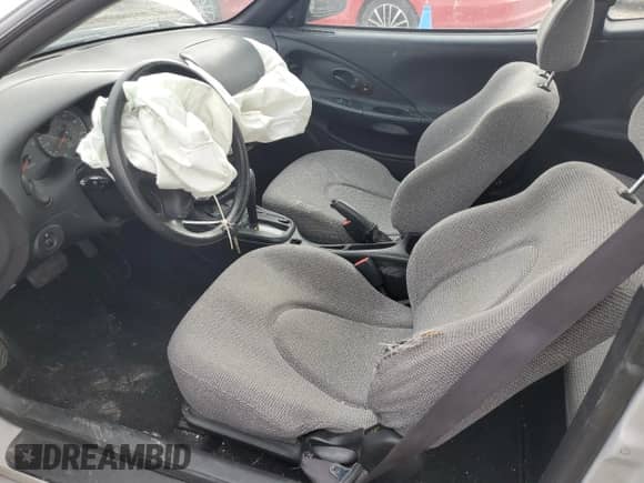 1999 Hyundai Tiburon с VIN KMHJG24F8XU126762, выставлен на аукционе Copart как лот 88747725 с пробегом 51 296 миль миль и Списание • Salvage title. История ставок и продаж доступна на DreamBid. Изображение 7.