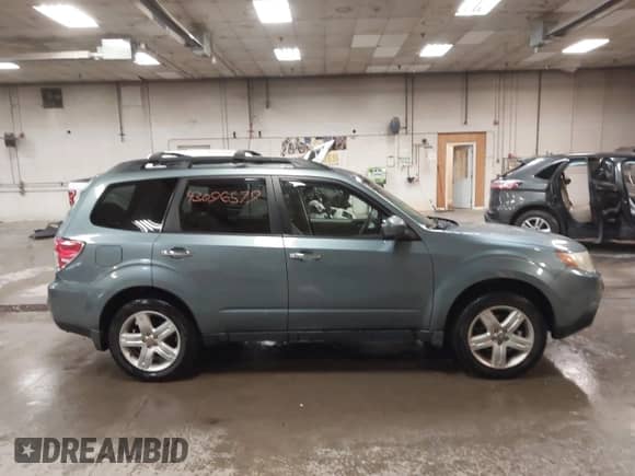 2009 Subaru Forester X with VIN JF2SH63639H719392, listed as a IAAI auction lot 43096579 with 123,436 mi miles and . Bid and sale history available at DreamBid. Image 13.