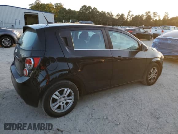 2012 Chevrolet Sonic LT z VIN 1G1JC6SH5C4140536, wystawiony jako Copart lot #85145585 z przebiegiem 93 734 mil mil oraz Szkoda całkowita • Salvage title. Historia ofert i sprzedaży dostępna na DreamBid. Obrazek 3.