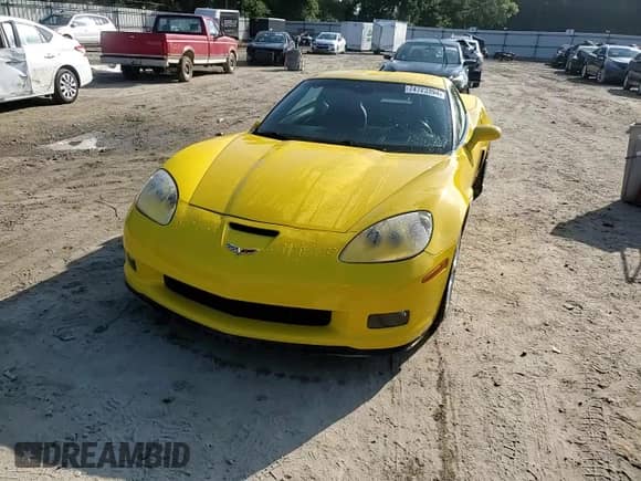 2006 Chevrolet Corvette Z06 с VIN 1G1YY26E065103952, выставлен на аукционе Copart как лот 74723394 с пробегом 80 258 миль миль и Списание • Salvage title. История ставок и продаж доступна на DreamBid. Изображение 11.