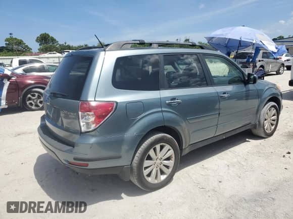 2011 Subaru Forester X Premium с VIN JF2SHBDC7BH782885, выставлен на аукционе Copart как лот 67277835 с пробегом 118 602 миль миль и Списание • Salvage title. История ставок и продаж доступна на DreamBid. Изображение 3.