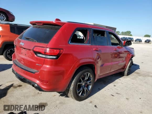 2014 Jeep Grand Cherokee SRT-8 z VIN 1C4RJFDJ6EC331312, wystawiony jako Copart lot #59111145 z przebiegiem 112 803 mil mil oraz Szkoda całkowita • Salvage title. Historia ofert i sprzedaży dostępna na DreamBid. Obrazek 3.