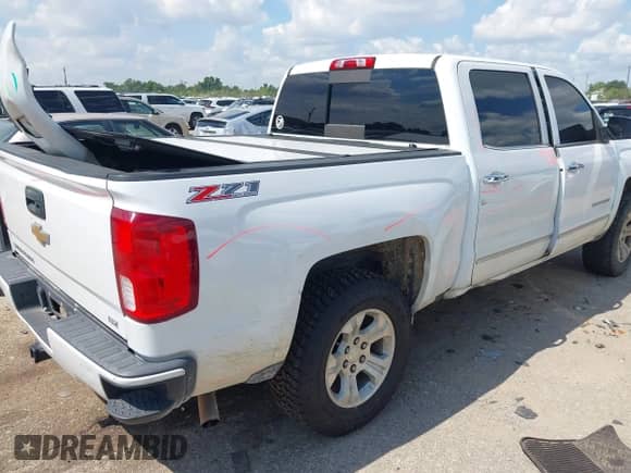 2017 Chevrolet Silverado 1500 LTZ z VIN 3GCUKSEJ8HG153838, wystawiony jako IAAI lot #42899717 z przebiegiem 188 513 mil mil oraz . Historia ofert i sprzedaży dostępna na DreamBid. Obrazek 4.