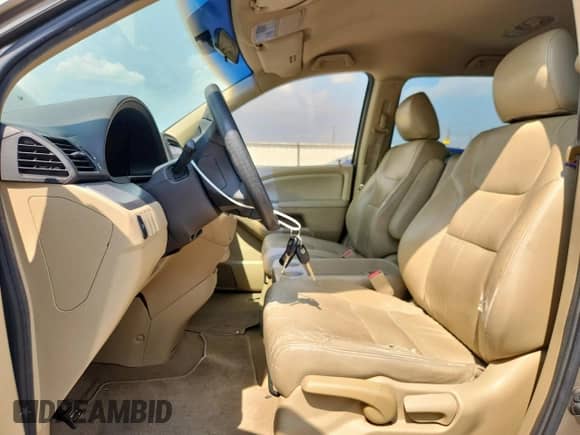 2010 Honda Odyssey LX with VIN 5FNRL3H22AB001532, listed as a Copart auction lot 71526925 with 152,696 mi miles and Salvage title. Bid and sale history available at DreamBid. Image 7.