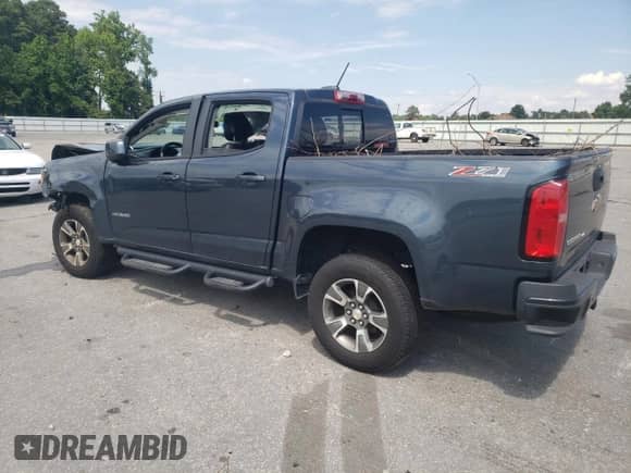 2020 Chevrolet Colorado 4WD Z71 with VIN 1GCGTDEN1L1161201, listed as a Copart auction lot 58840584 with 60,456 mi miles and Salvage title. Bid and sale history available at DreamBid. Image 2.