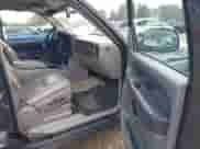 2003 Chevrolet Suburban LS z VIN 3GNEC16Z03G277179, wystawiony jako IAAI lot #43466017 z przebiegiem 291 732 mil mil oraz . Historia ofert i sprzedaży dostępna na DreamBid. Obrazek 5.