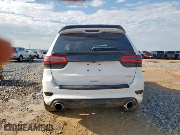 2015 Jeep Grand Cherokee SRT with VIN 1C4RJFDJ8FC797020, listed as a Copart auction lot 69139355 with Not provided miles and Non repairable. Bid and sale history available at DreamBid. Image 6.