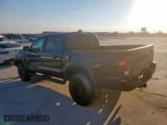 2018 Toyota Tacoma TRD Pro с VIN 5TFCZ5AN0JX156137, выставлен на аукционе Copart как лот 81966775 с пробегом 90 905 миль миль и Списание • Salvage title. История ставок и продаж доступна на DreamBid. Изображение 2.