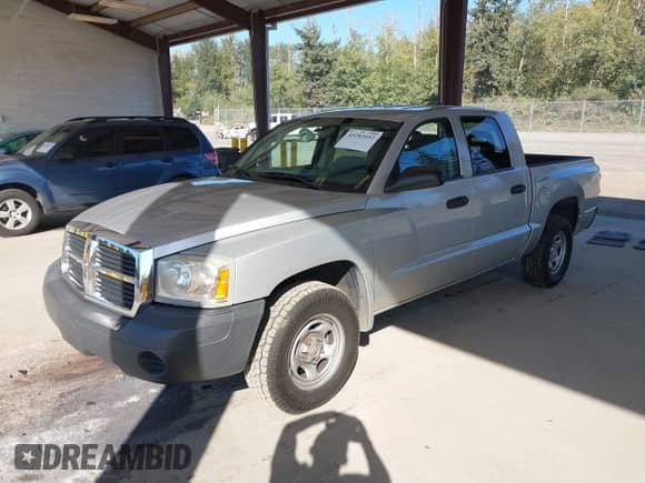 2006 Dodge Dakota ST with VIN 1D7HW28N36S710817, listed as a IAAI auction lot 43283452 with 169,214 mi miles and . Bid and sale history available at DreamBid. Image 2.