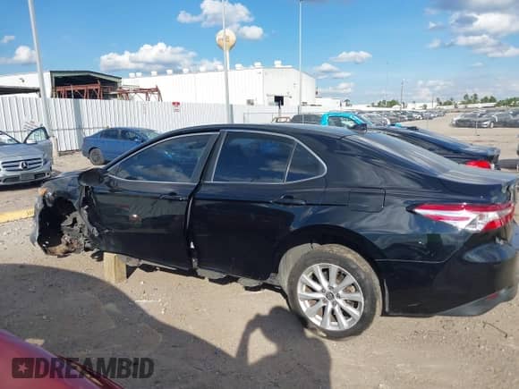 2019 Toyota Camry SE z VIN 4T1B11HK4KU167017, wystawiony jako IAAI lot #43389705 z przebiegiem 106 141 mil mil oraz . Historia ofert i sprzedaży dostępna na DreamBid. Obrazek 14.