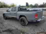 2003 Dodge Dakota Sport с VIN 1D7HL38N63S192308, выставлен на аукционе Copart как лот 77494684 с пробегом 128 512 миль миль и Списание • Salvage title. История ставок и продаж доступна на DreamBid. Изображение 2.