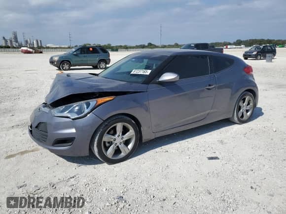 2013 Hyundai Veloster w/Black Int z VIN KMHTC6AD0DU094688, wystawiony jako Copart lot #87237165 z przebiegiem 81 433 mil mil oraz Szkoda całkowita • Salvage title. Historia ofert i sprzedaży dostępna na DreamBid. Obrazek 1.