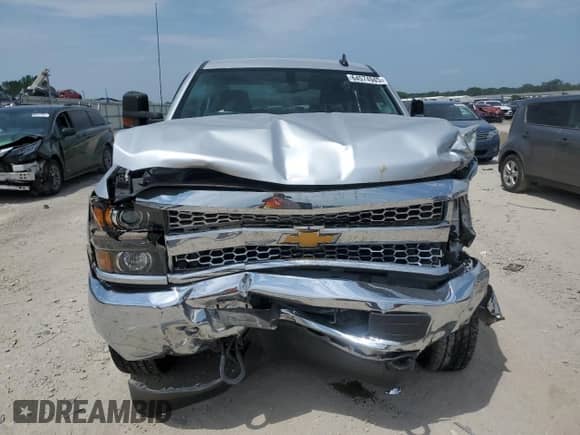 2019 Chevrolet Silverado 2500HD Work Truck z VIN 1GC1KREG9KF155249, wystawiony jako Copart lot #64574945 z przebiegiem 125 038 mil mil oraz Szkoda całkowita • Salvage title. Historia ofert i sprzedaży dostępna na DreamBid. Obrazek 5.
