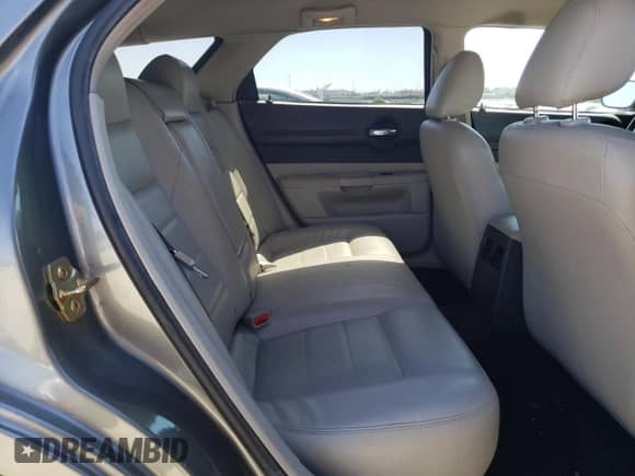 2005 Dodge Magnum SE with VIN 2D4FV48V55H158780, listed as a Copart auction lot 61124775 with 233,129 mi miles and Salvage title. Bid and sale history available at DreamBid. Image 10.