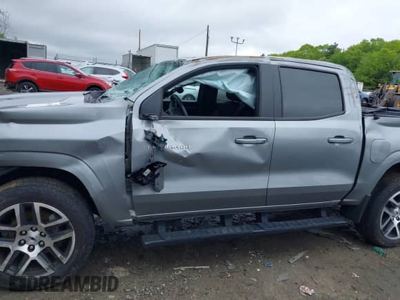 2023 Chevrolet Colorado 4WD Z71 with VIN 1GCPTDEK5P1245985, listed as a IAAI auction lot 42257455 with 48,708 mi miles and . Bid and sale history available at DreamBid. Image 14.